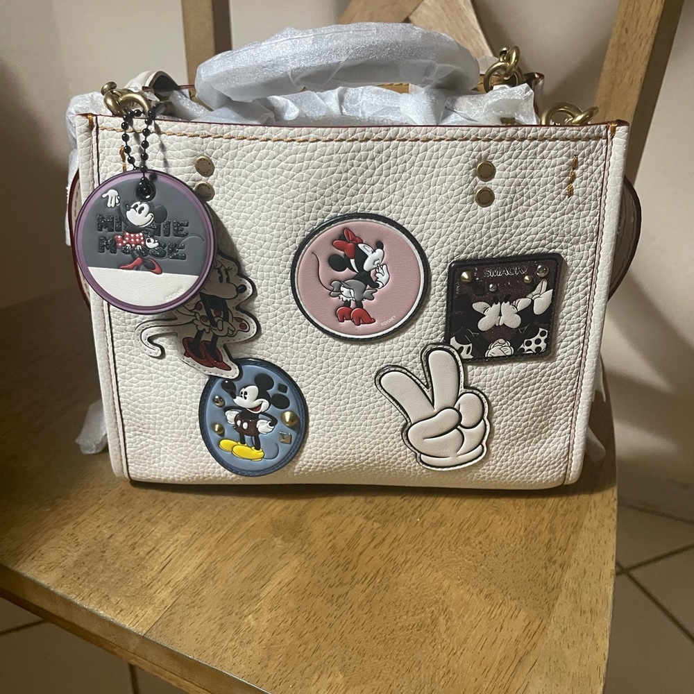 Coach Disney Minney Mouse Chalk Rogue Handbag with keychain and wristlet.